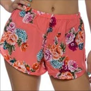 Floral coral shorts.
